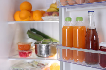 Modern refrigerator with different fresh food products, closeupの写真素材