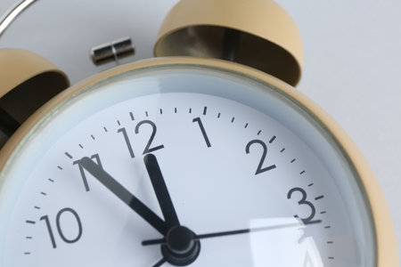 One alarm clock on white background, closeup