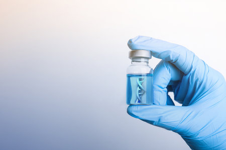 Scientist holding vial with vaccine and DNA strand on gray gradient background, closeup