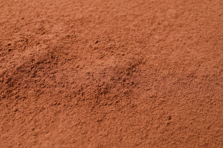 Pile of cocoa powder as background, closeupの写真素材