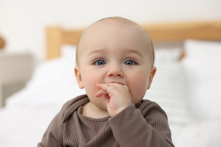 Cute little child at home. Adorable baby