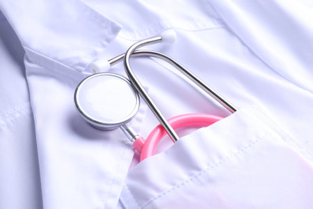 Doctor's white coat with stethoscope as background, closeupの写真素材