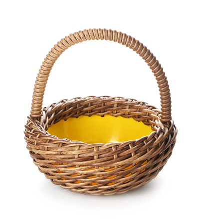 One empty wicker basket isolated on whiteの写真素材