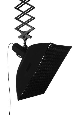 Professional lighting equipment hanging on white background