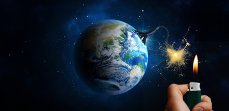 Earth globe with fuse ignited by man with lighter in space. Anthropogenic planetary crisis, world...
