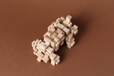 Wooden blocks on brown background