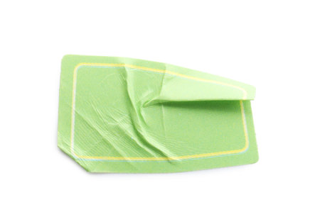 Crumpled green sticker with frame isolated on white, top viewの写真素材