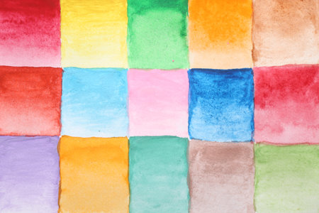 Painted watercolor samples as background, top viewの写真素材