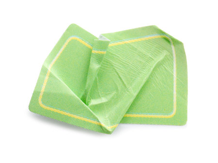 Crumpled green sticker with frame isolated on white, top viewの写真素材