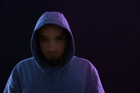 Man with unrecognizable pixelated face