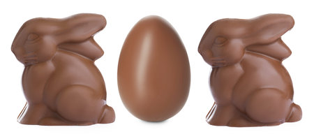 Chocolate bunnies and eggs isolated on white. Easter celebration