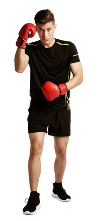 Athletic man in red boxing gloves on white background