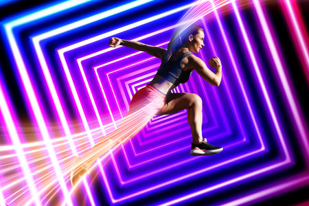 Young sporty woman running against bright pattern. Neon lines coming through her symbolizing energy and motionの写真素材
