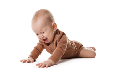 Portrait of cute little baby on white backgroundの写真素材