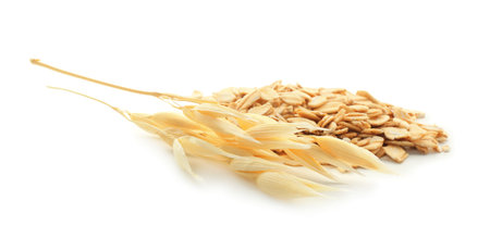 Oat flakes and florets isolated on white