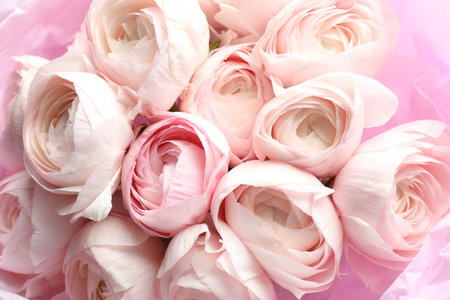 Bouquet of beautiful ranunculus flowers as background, closeup