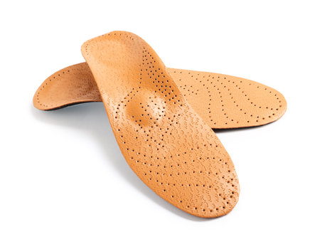 Pair of orthopedic insoles isolated on whiteの写真素材