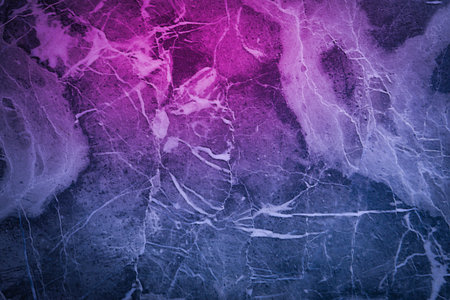 Neon lights on textured surface. Color gradient from pink to blue