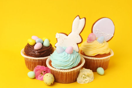 Tasty cupcakes with Easter decor, closeup