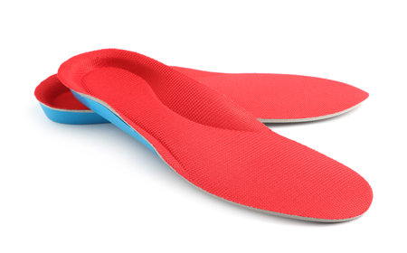Pair of orthopedic insoles isolated on white