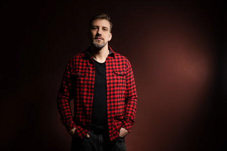 Man with beard on dark background. Space for textの写真素材