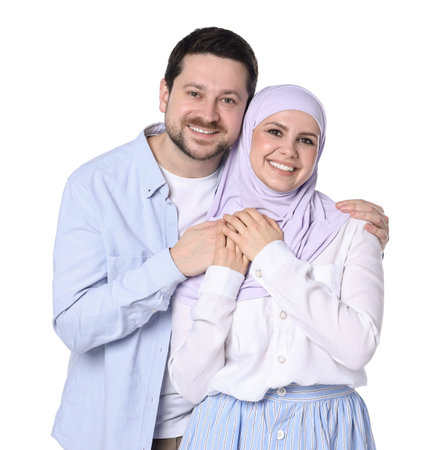 Portrait of happy muslim couple on white backgroundの写真素材