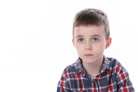 Autism. Little boy with ASD on white background