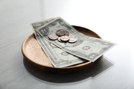 Tips on presenter at light wooden table, closeup