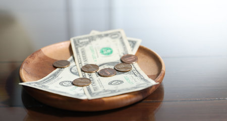 Tips on presenter at wooden table, closeup. Space for text
