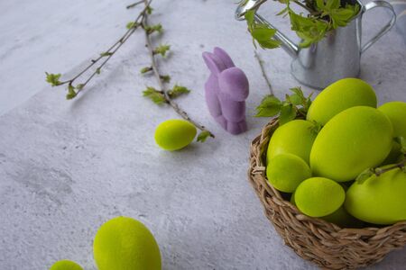 Set of colorful easter egg on wooden background with drawing of rabbitの写真素材