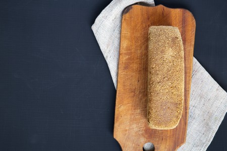 Bread on dark background. From above. Top view. Copy space.