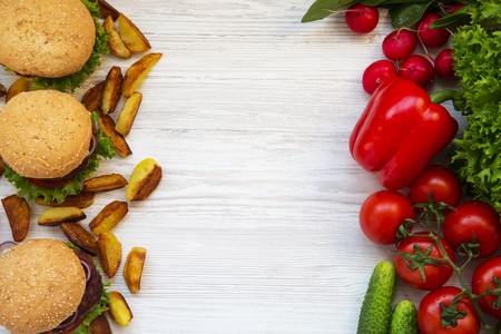 Healthy or unhealthy food. Copy space. Top view.の写真素材