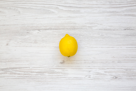 Lemon on a white wooden background, top view.の写真素材