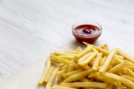 Tasty french fries with ketchup, side view. の写真素材