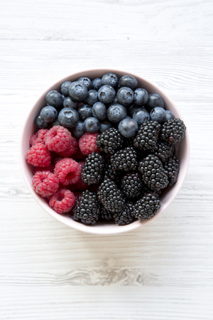 Full bowl of berries, top view. Summer berry. From above, overhead.の写真素材