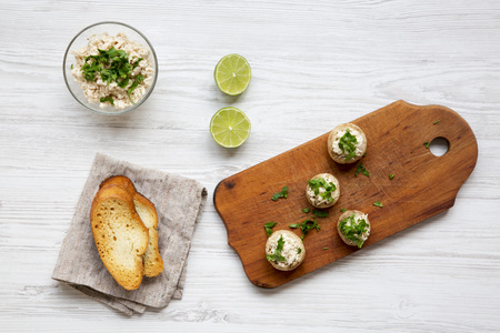 Mushroom and chicken puree with lime and toasts, top view. Flat lay, overhead.の写真素材
