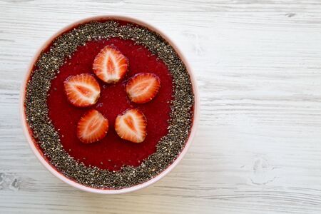Top view bowl of strawberry smoothie with chia seeds. From above. Copy space and text area.の写真素材