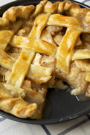 Homemade apple pie on cloth, low angle view. Closeup.の写真素材