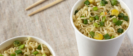 Tasty instant ramen noodles with beef flavoring, low angle view. Close-up.の写真素材