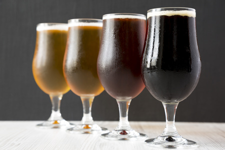 Different beers, side view. Close-up.