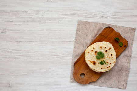 Homemade Tomato Salsa on a white wooden surface, top view. Flat lay, overhead, from above.の写真素材