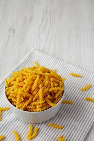 Raw Dry Organic Rotini Pasta Ready to Cook, side view. copyspace.の写真素材