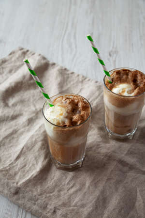 Homemade Ice Cream Float with Cola. Sweet Refreshment Drink, side view.
