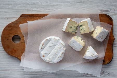 Alpine Blue Cheese on a rustic wooden board, overhead view. Flat lay, top view, from above.の写真素材