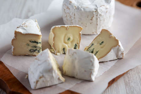 Alpine Blue Cheese on a rustic wooden board, side view. close-up.の写真素材