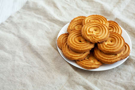 Homemade Sprits Biscuits on a Plate, side view.の写真素材