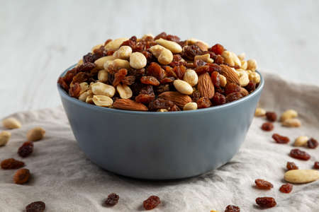 Raw Trail Mix with Nuts and Fruits in a Bowl, side view. close-up.の写真素材