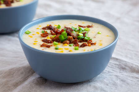 Homemade Corn Chowder with Bacon in Bowls, side view. close-up.の写真素材