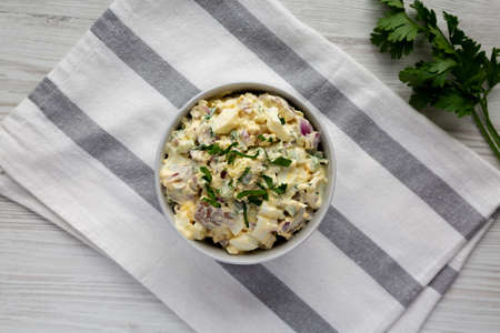 Homemade Healthy Potato Salad with Eggs in a Bowl, top view. Flat lay, overhead, from above.の写真素材