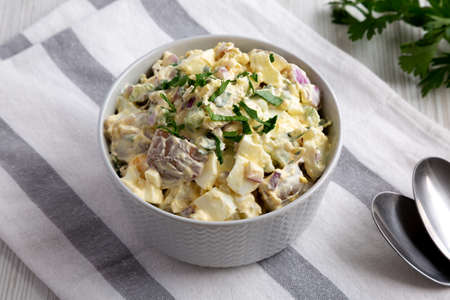 Homemade Healthy Potato Salad with Eggs in a Bowl, side view.の写真素材